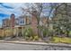 Well-maintained exterior with brick chimneys, landscaping, and private yard at 14110 E Dickinson Dr # A, Aurora, CO 80014