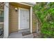 Inviting front entrance with a security door, and landscaping at 14110 E Dickinson Dr # A, Aurora, CO 80014
