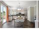 Eat-in kitchen with granite countertops, stainless steel appliances and a view to the backyard at 16690 Amberstone Way, Parker, CO 80134