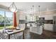 Bright kitchen with stainless steel appliances, a center island, and a dining area at 16690 Amberstone Way, Parker, CO 80134