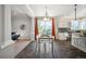 Open floor plan connecting the kitchen and living room; great for entertaining guests at 16690 Amberstone Way, Parker, CO 80134