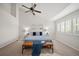 Spacious main bedroom with vaulted ceiling, ceiling fan, and bright, natural light at 16690 Amberstone Way, Parker, CO 80134
