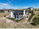 Aerial view of a two-story home with backyard at 8263 Merryvale Trl, Parker, CO 80138