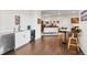 Basement wet bar with sink, dishwasher, and mini-fridge at 8263 Merryvale Trl, Parker, CO 80138