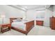 Basement bedroom with a wooden bed frame and ample closet space at 8263 Merryvale Trl, Parker, CO 80138