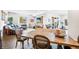 Spacious basement with living area, dining table, and access to the backyard at 8263 Merryvale Trl, Parker, CO 80138