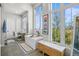 Spa-like bathroom with large tub and natural light at 8263 Merryvale Trl, Parker, CO 80138