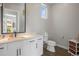Clean powder room with white vanity and modern fixtures at 8263 Merryvale Trl, Parker, CO 80138
