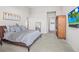 Bright bedroom with large bed and wood furniture at 8263 Merryvale Trl, Parker, CO 80138