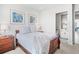 Charming bedroom with wood furniture and ensuite bathroom at 8263 Merryvale Trl, Parker, CO 80138
