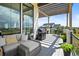 Spacious deck with pergola, seating area, and grill, offering scenic views at 8263 Merryvale Trl, Parker, CO 80138