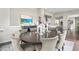 Elegant dining room featuring an oval table and comfortable seating at 8263 Merryvale Trl, Parker, CO 80138