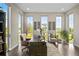 Home office with built-in desk and plenty of natural light at 8263 Merryvale Trl, Parker, CO 80138