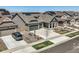 Modern homes with solar panels and landscaped yards in a residential area at 8803 S Winnipeg Ct, Aurora, CO 80016