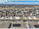 Aerial view of community showcasing many homes with solar panels at 8803 S Winnipeg Ct, Aurora, CO 80016