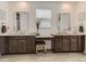 Double vanity bathroom with granite countertops and large walk-in shower at 8803 S Winnipeg Ct, Aurora, CO 80016