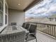 Relaxing deck with patio furniture and mountain views at 8803 S Winnipeg Ct, Aurora, CO 80016