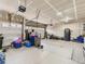 Spacious two-car garage with additional storage space at 8803 S Winnipeg Ct, Aurora, CO 80016