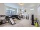 Spacious bedroom, featuring lots of toys and plenty of natural light for comfortable play at 13589 E 102Nd Pl, Commerce City, CO 80022