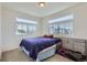 Bright bedroom with two large windows, neutral carpet, and space for comfortable furnishings at 13589 E 102Nd Pl, Commerce City, CO 80022