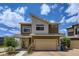 Beautiful two-story home with a modern design, landscaped front yard, and an attached two-car garage at 13589 E 102Nd Pl, Commerce City, CO 80022