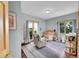 Bright Bedroom with mountain views, gray accent rug and curtains, and wooden furniture at 14980 Elk Mountain Trl, Littleton, CO 80127