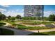 Beautifully landscaped gardens with walking paths and lush greenery, enhancing the property's appeal at 3131 E Alameda Ave # 1604, Denver, CO 80209