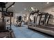 Well-equipped gym with modern exercise equipment, including treadmills, ellipticals, and stationary bikes at 3131 E Alameda Ave # 1604, Denver, CO 80209