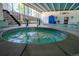 Relax in the hot tub adjacent to the indoor pool, perfect for unwinding after a long day at 3131 E Alameda Ave # 1604, Denver, CO 80209