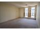 Open living room area with great window views at 3131 E Alameda Ave # 1604, Denver, CO 80209