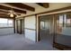 Open living room with wood trim doorway and great natural light at 3131 E Alameda Ave # 1604, Denver, CO 80209