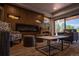 Relaxing lobby with modern fireplace, stylish seating, and natural light, creating a welcoming atmosphere at 3131 E Alameda Ave # 1604, Denver, CO 80209