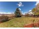 A large grassy backyard and mountain views at 1678 S Parkdale Cir, Erie, CO 80516