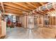 Unfinished basement with exposed wooden beams at 1678 S Parkdale Cir, Erie, CO 80516
