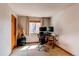 Bright home office provides the perfect space to work from home at 1678 S Parkdale Cir, Erie, CO 80516