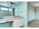 Bathroom features a granite countertop, vanity, tile flooring and updated fixtures at 152 Pelican Ave, Brighton, CO 80601