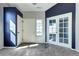 Bright entryway featuring neutral walls, carpet flooring, and natural light at 152 Pelican Ave, Brighton, CO 80601