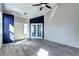 Bright entryway featuring neutral walls, carpet flooring, and natural light at 152 Pelican Ave, Brighton, CO 80601