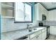 Close up of kitchen with stainless steel appliances, granite countertops and subway tile backsplash at 152 Pelican Ave, Brighton, CO 80601