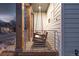 Inviting porch with a cozy swing, perfect for relaxing outdoors at 2550 Xanthia Ct, Denver, CO 80238