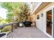Outdoor deck featuring a Blackstone grill with wood flooring, perfect for summer barbecues at 15963 Rock Crystal Dr, Parker, CO 80134