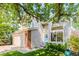 Beautiful home with brick accents, large windows, and lush landscaping for curb appeal at 15963 Rock Crystal Dr, Parker, CO 80134