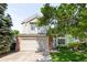 Charming two-story home featuring a two-car garage and a well-manicured front yard at 15963 Rock Crystal Dr, Parker, CO 80134
