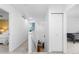 Hallway features neutral carpet with bedrooms visible, showing a clean and well-lit transition space at 15963 Rock Crystal Dr, Parker, CO 80134