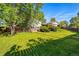 Well maintained backyard featuring a lush green lawn and established landscaping in a quiet neighborhood at 1905 S Linden Ct, Denver, CO 80224