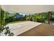 Large covered patio area with ample space for outdoor entertaining at 1905 S Linden Ct, Denver, CO 80224