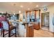 Open kitchen featuring granite countertops, stainless steel appliances, and wood cabinets at 995 Nob Hill Rd, Evergreen, CO 80439
