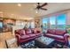 Open living room with hardwood floors and scenic mountain views at 995 Nob Hill Rd, Evergreen, CO 80439