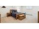 Bright bedroom features a comfortable bed with matching wood furniture and natural light at 5340 S Logan Dr, Greenwood Village, CO 80121