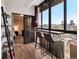 Balcony showcasing city views, a breakfast bar, and access to the cozy interior at 800 N Pearl St # 709, Denver, CO 80203